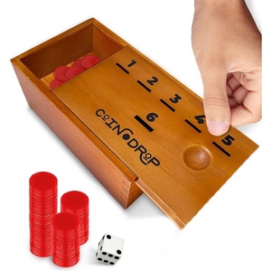image:imageSWOOC Games  Coin Drop  Simple  Strategic Dice Games for Families with Coins Included for 26 Players  Works WPennies Too  Get Rid of Coins to Win  Board Games for Kids  Penny Game Wood Box